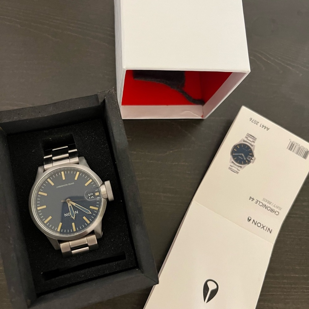 Nixon Chronicle 44…. Blue and silver.  Never worn…